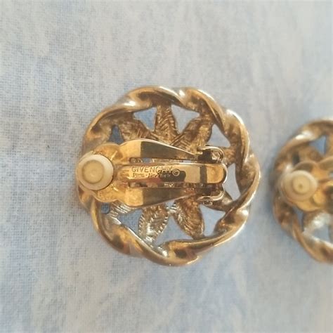 vintage givenchy hinged twisted bracelet|vintage givenchy clip on earrings.